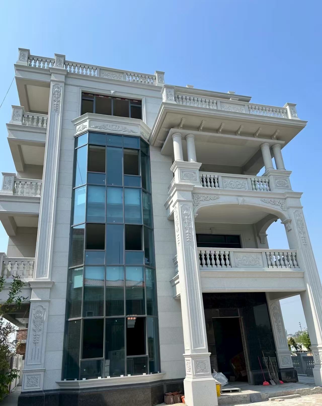 资阳 白麻花岗岩别墅外墙干挂效果展示